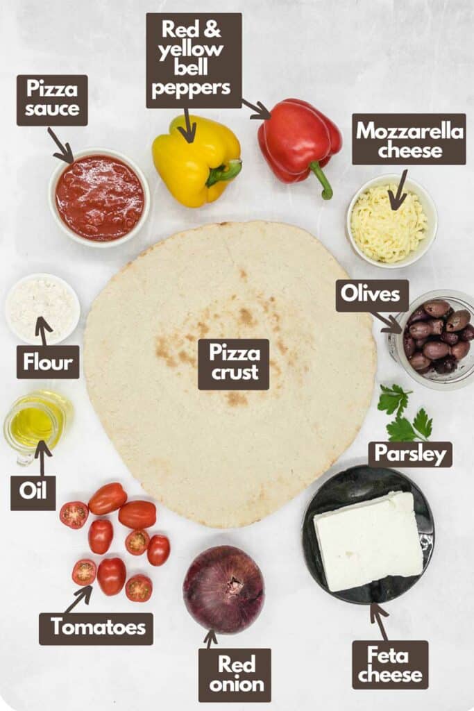 Ingredients needed; pizza sauce, read and yellow bell peppers, mozzarella cheese, kalamata olives, pizza crust, fresh parsley. feta cheese, red onion, tomatoes, olive oil, and flour.
