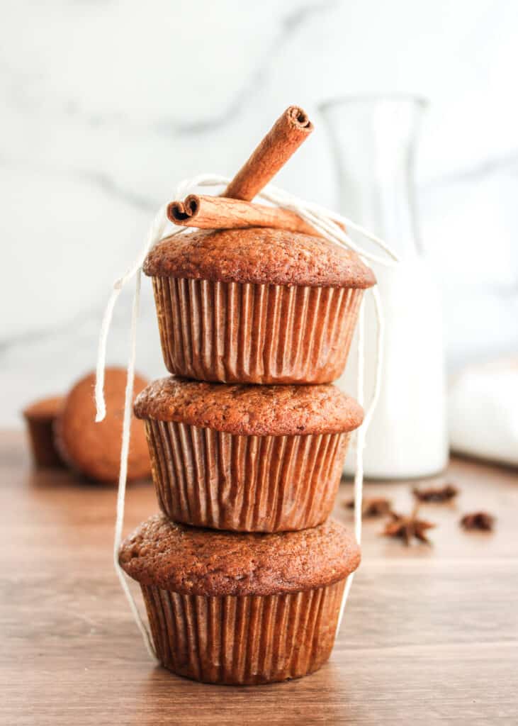 Pumpkin spice muffins stack tied with string.