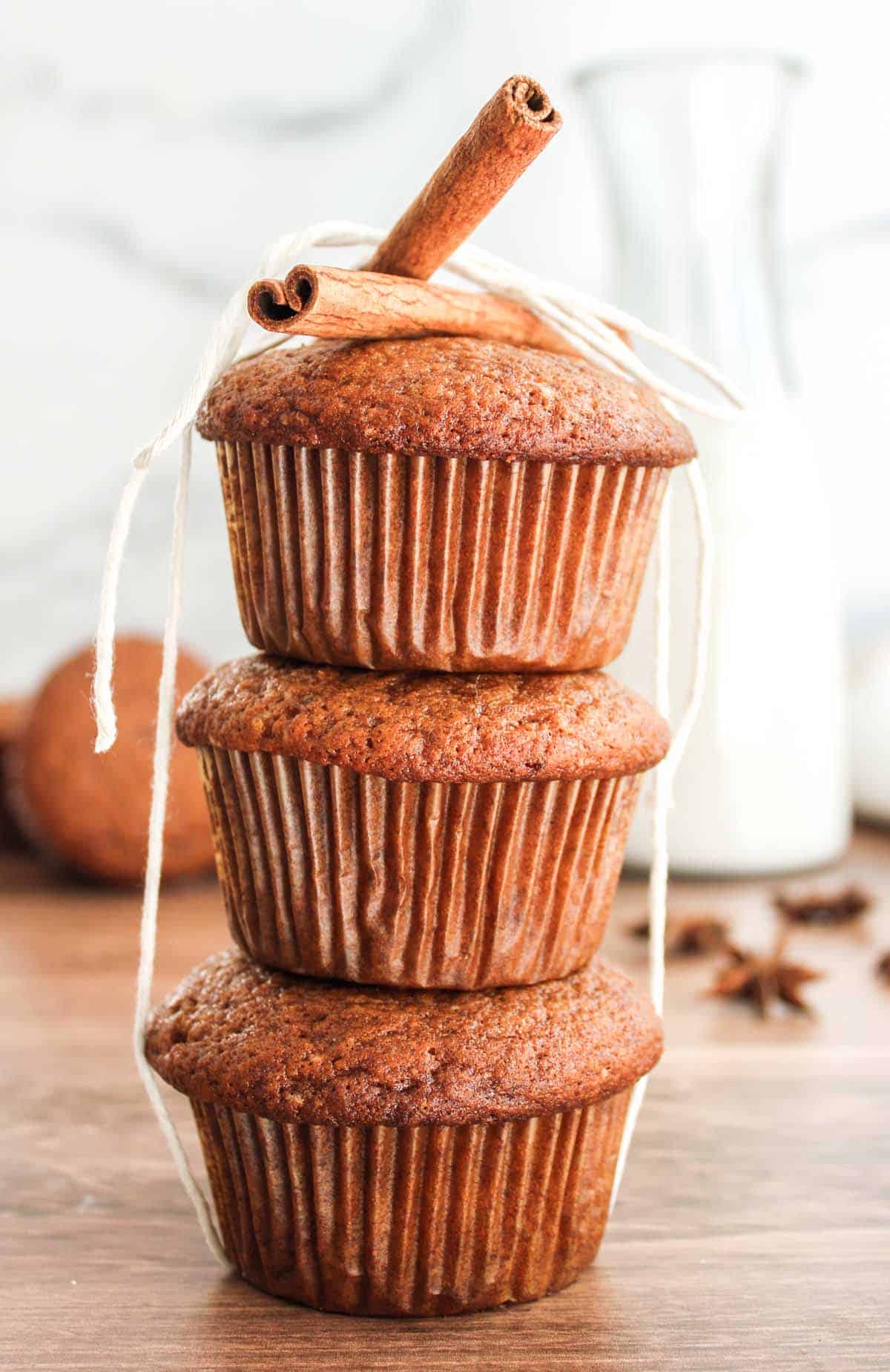 Pumpkin spice muffins in a stack.