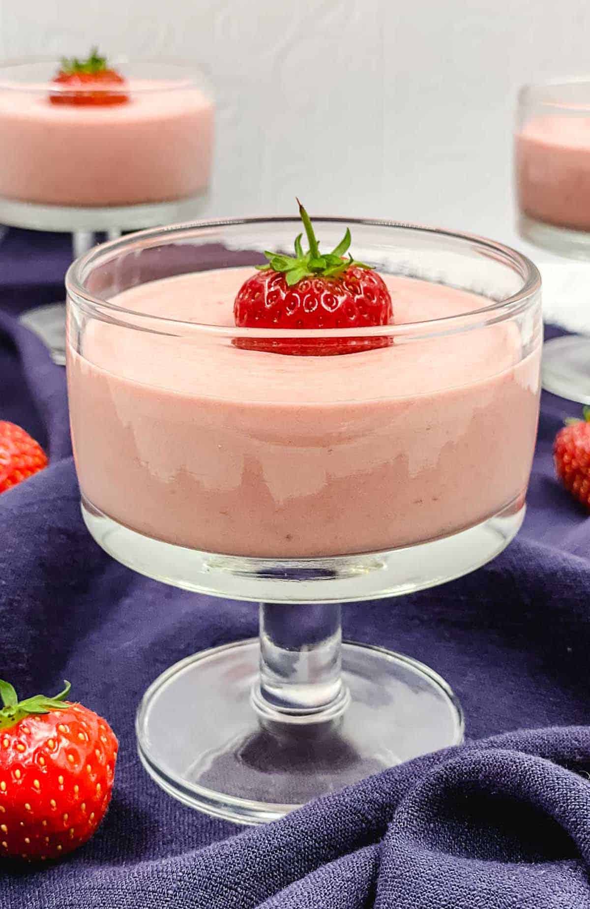 Homemade strawberry mousse in serving dishes.