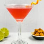Homemade Cosmopolitan cocktail with an orange twist.