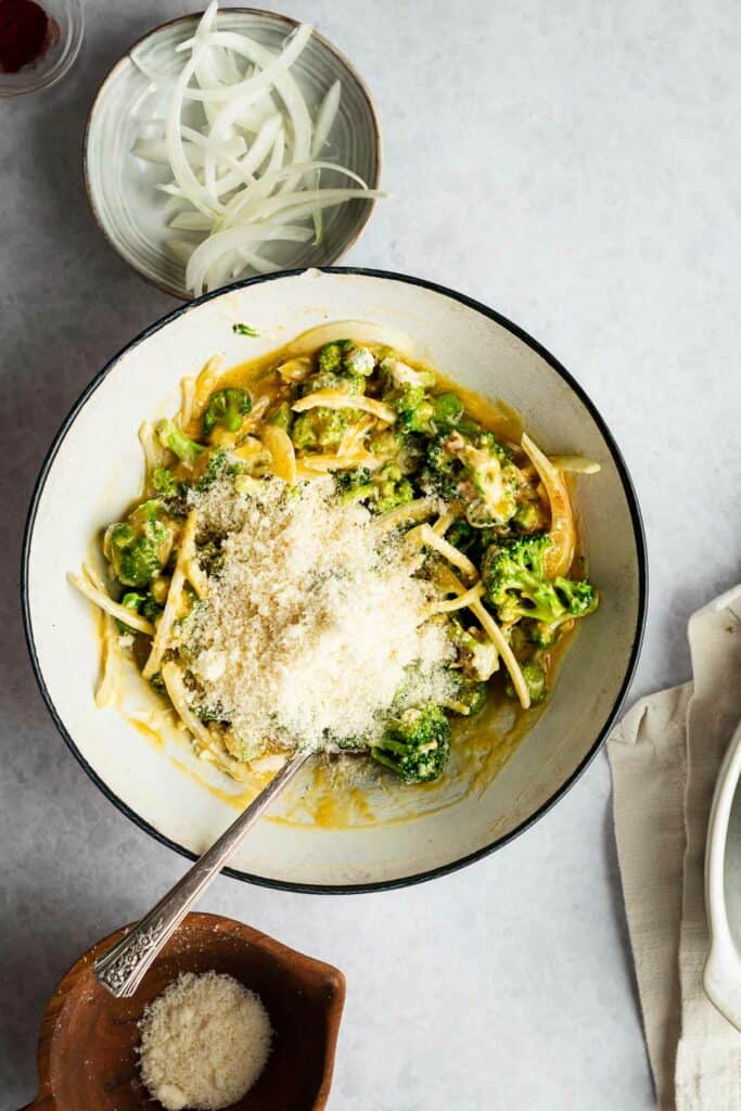 Ingredients mixed together with cheese on top.