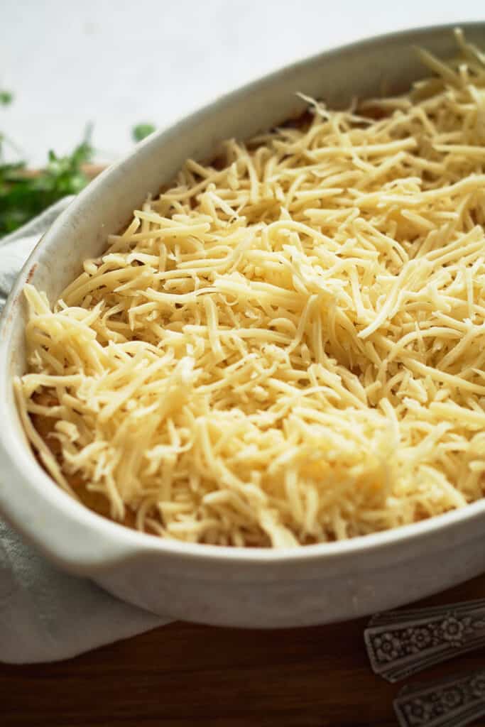 Cheese added to sweet corn casserole.