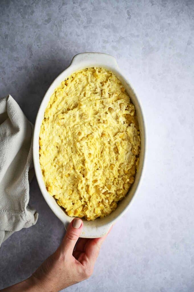 Creamed corn mixture place in a casserole dish.