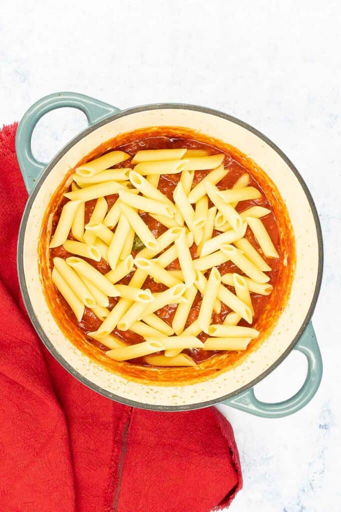 Cook pasta and add to the arrabbiata sauce.