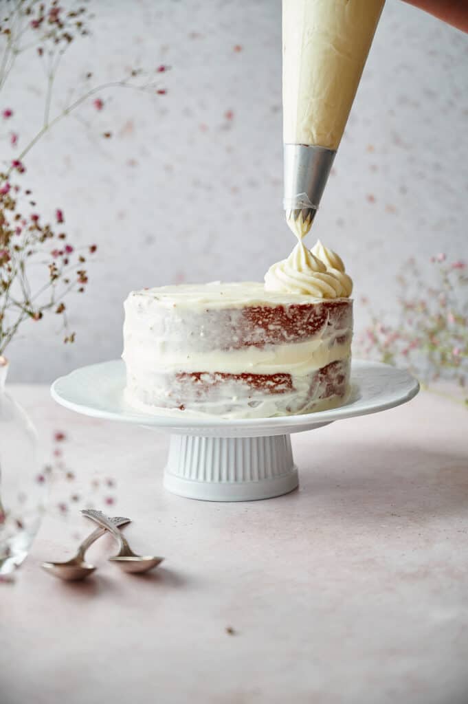 Piping decoration on top of the cake.