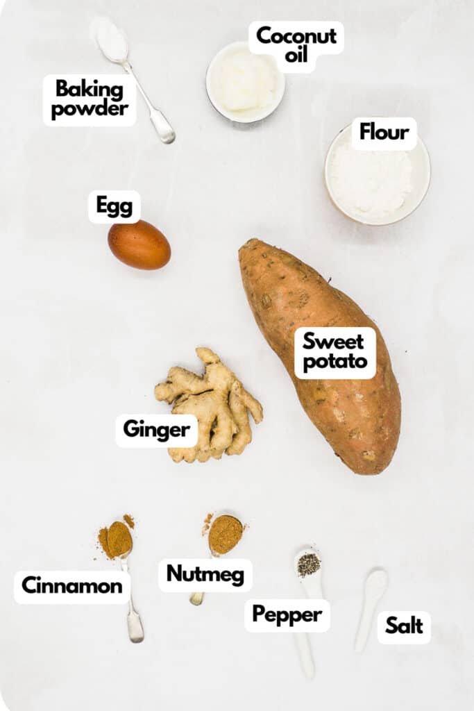 Ingredients needed, egg, baking powder, coconut oil, flour, sweet potato, fresh ginger, salt, pepper, ground nutmeg, and ground cinnamon.