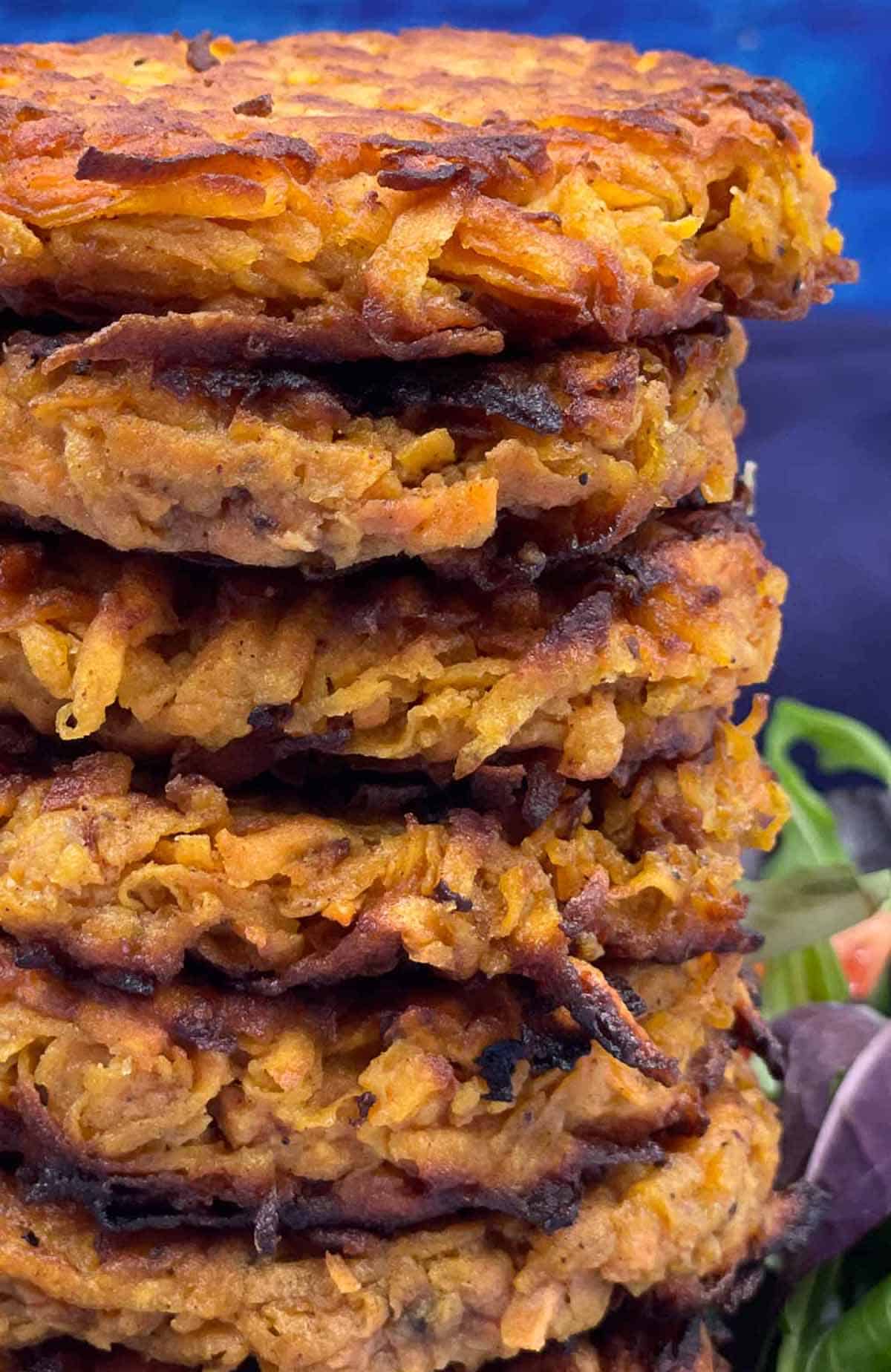 A stack of freshly made sweet potato fritters.