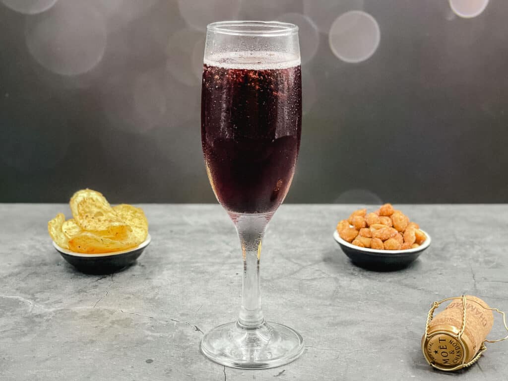 A stylish glass of kir royale ready to drink.