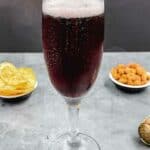 Kir royale just poured and ready to drink.