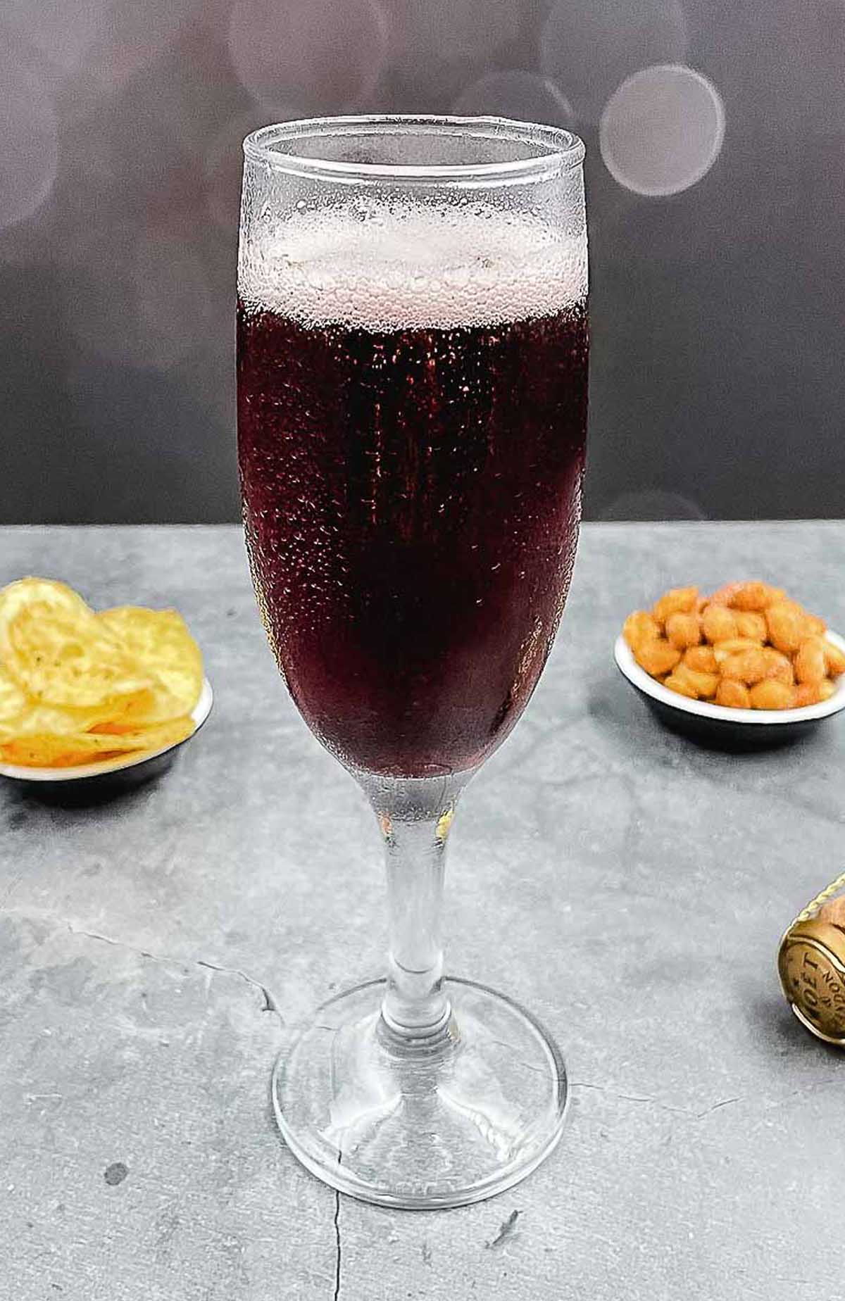 Kir royale just poured and ready to drink.