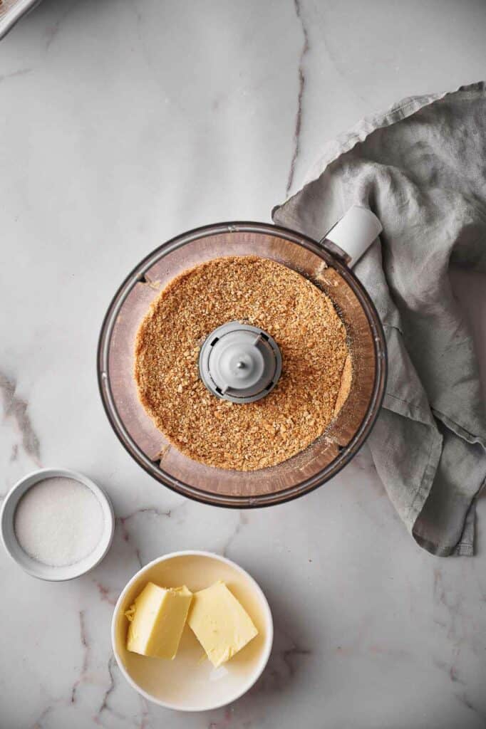 Graham cracker crumbs in a food processor.