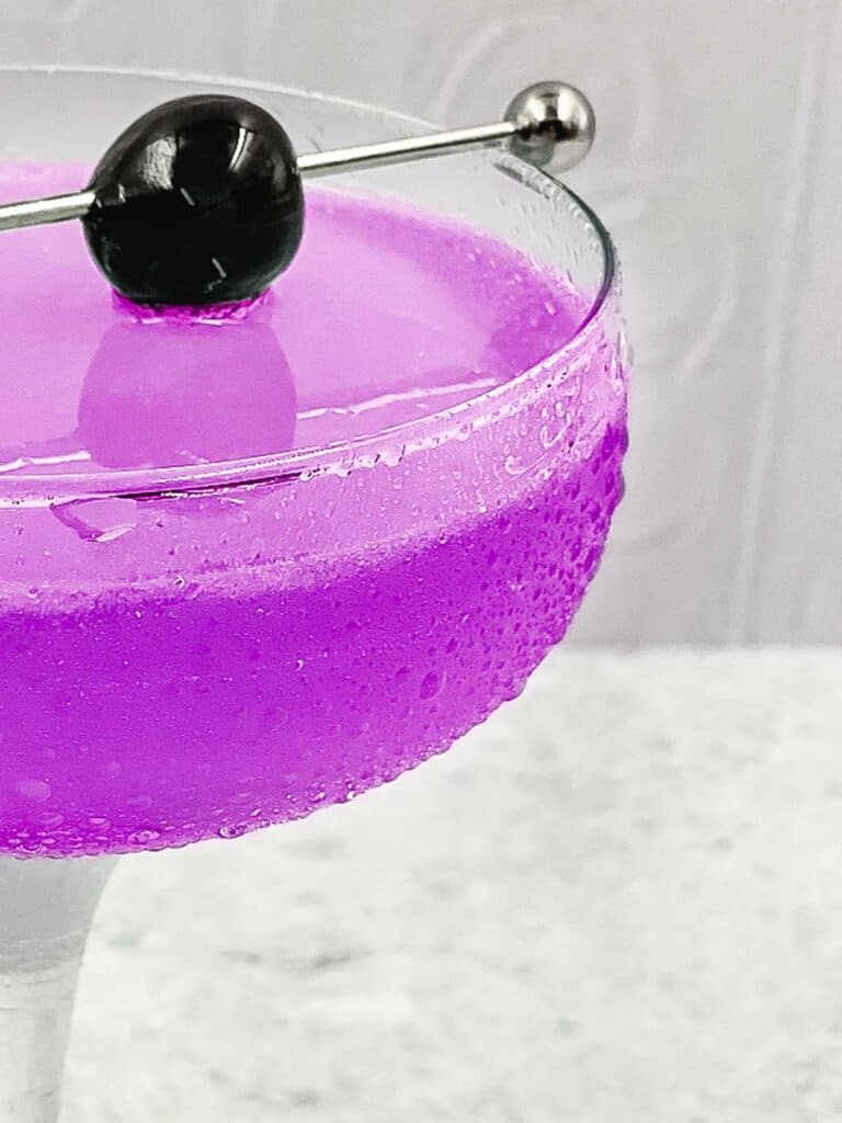 Half angle on a glass of aviator cocktail.