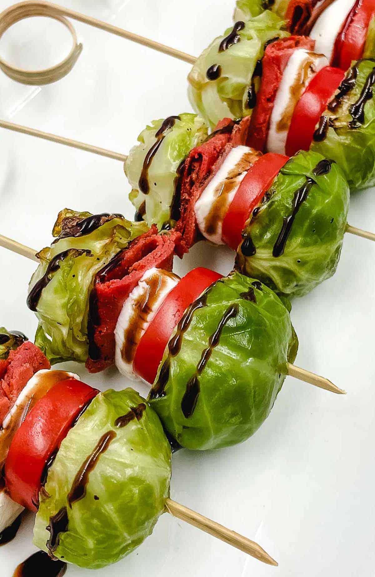Brussels sprouts sliders on a serving dish.