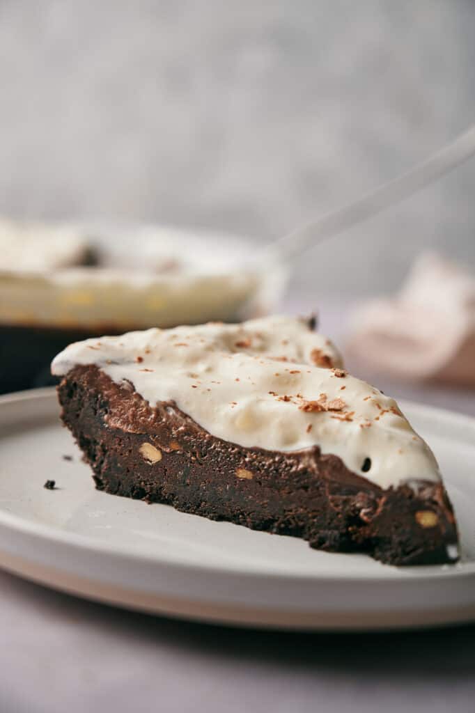 Mississippi mud pie on a plate, ready to eat.