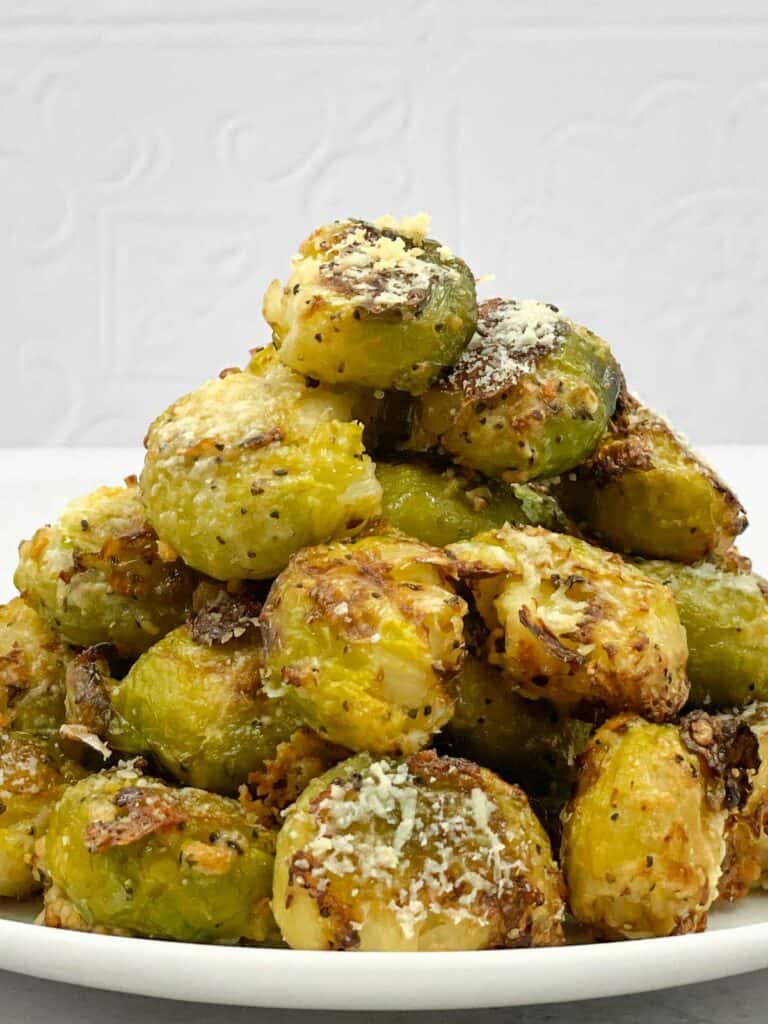 A bowl of freshly crispy Brussels sprouts air fryer smashed sprouts.