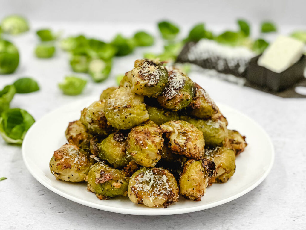 A bowl of air fryer smashed Brussels sprouts, ready to eat.
