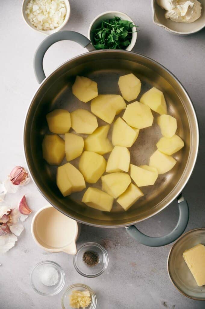 Potatoes boiled in a large pot.