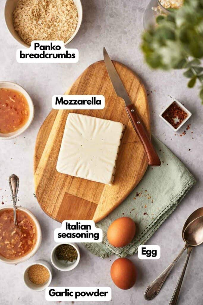 Ingredients needed, Panko breadcrumbs, mozzarella cheese, Italian seasoning, Garlic powder, and eggs.