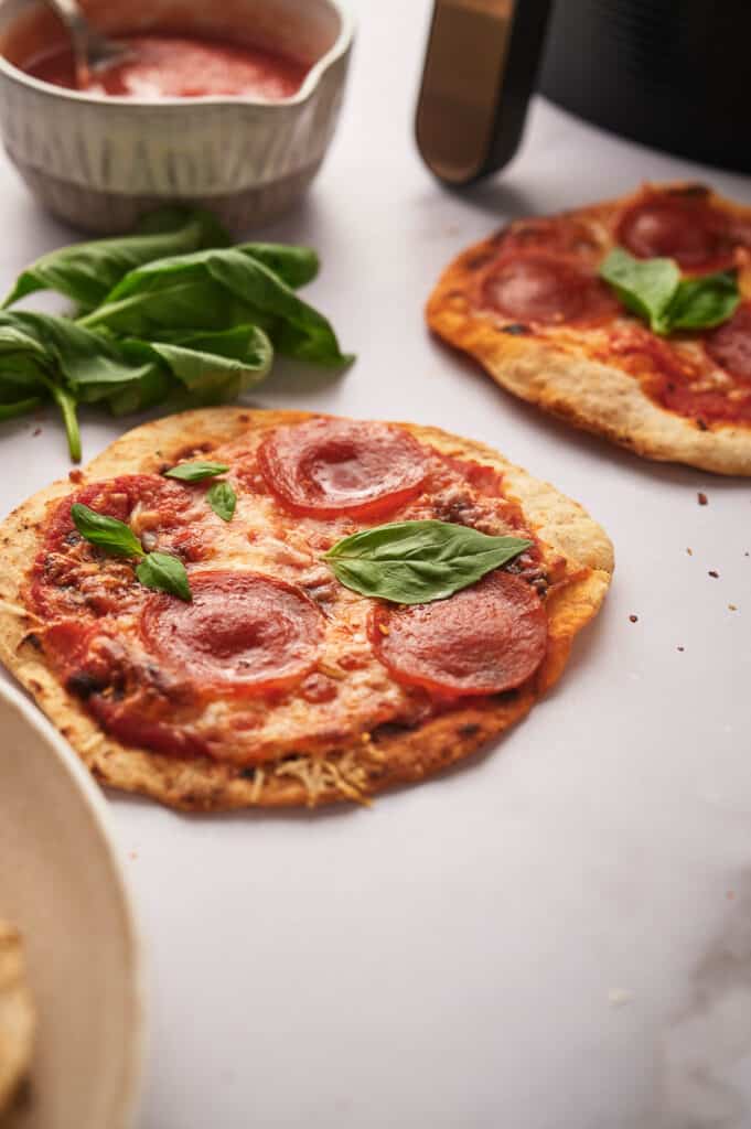Air fryer tortilla pizza just made and ready to eat.