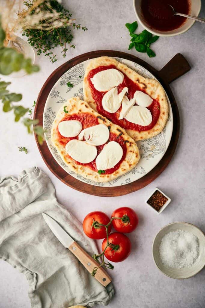 Adding fresh mozzarella.