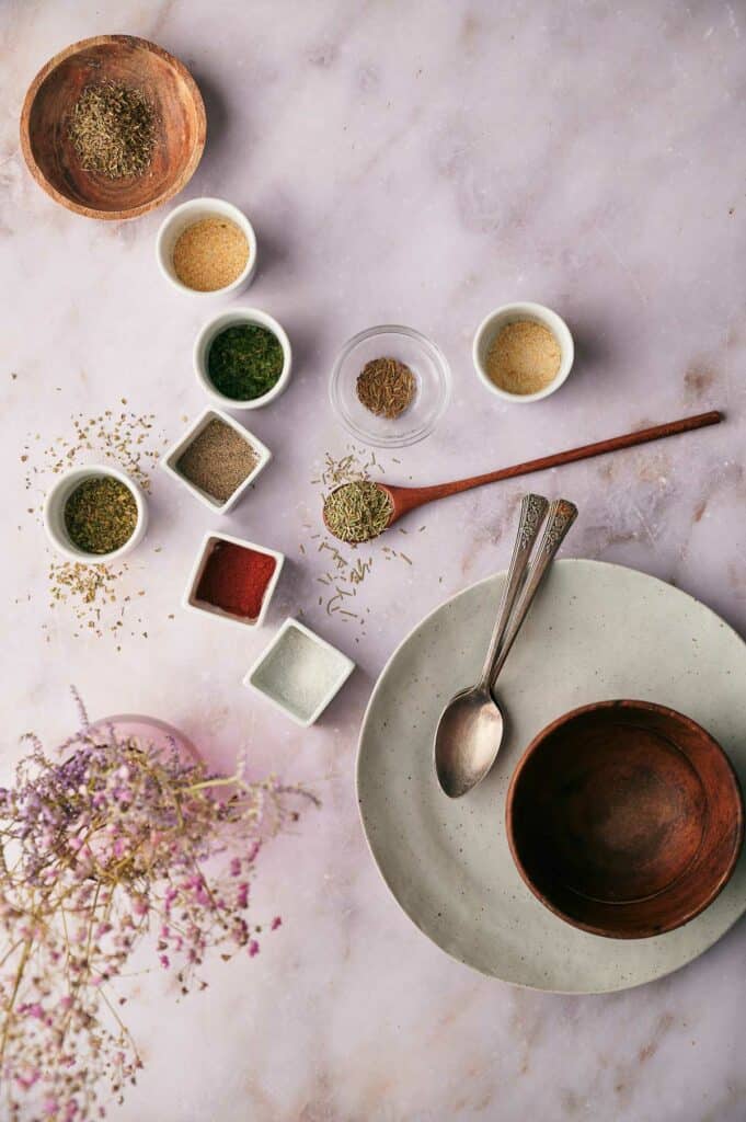 Ingredients needed, dried oregano, dried basil, minced garlic powder, onion powder, dried rosemary, dried thyme, dried fennel seeds, smoked paprika, and black pepper.