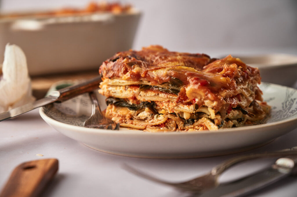 Absolutely delicious cooked veggie lasagna on a plate.