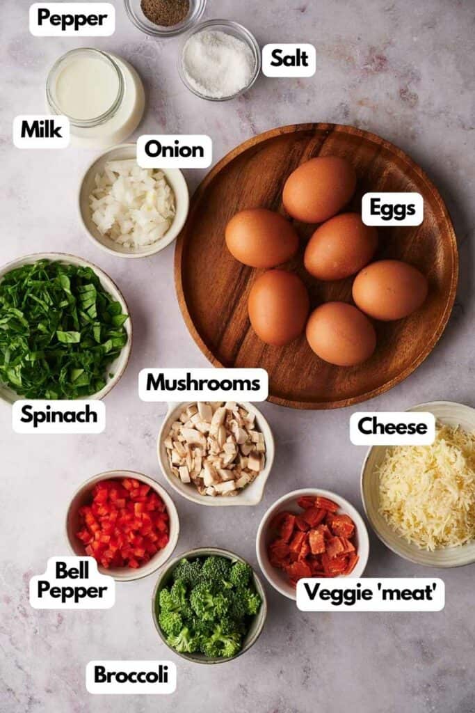 Ingredients needed, salt and pepper, milk, onion, eggs, cheese, veggie meat, broccoli, bell pepper, mushrooms, spinach, and onion.