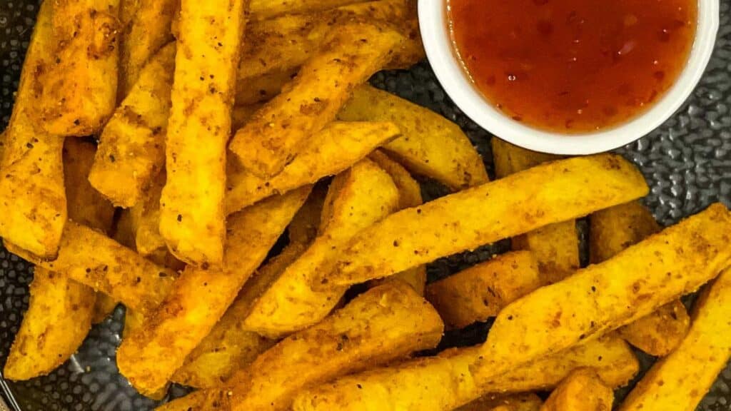 Masala fries with sweet chili sauce.