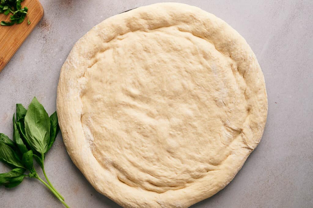 Neapolitan style pizza dough ready for pizza toppings.