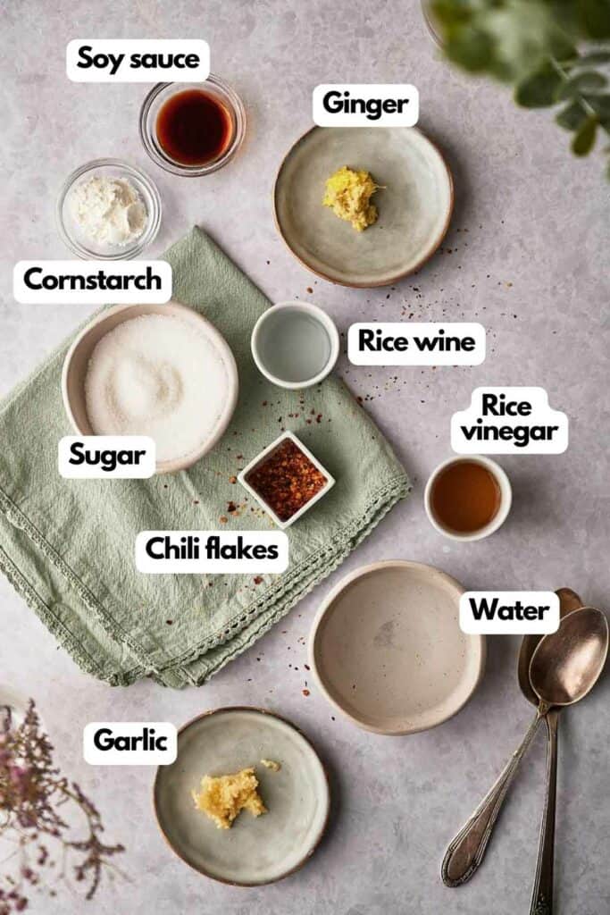 Ingredients needed; soy sauce, ginger, rice wine, rice vinegar, water, minced garlic, crushed chilies, sugar, and cornstarch.