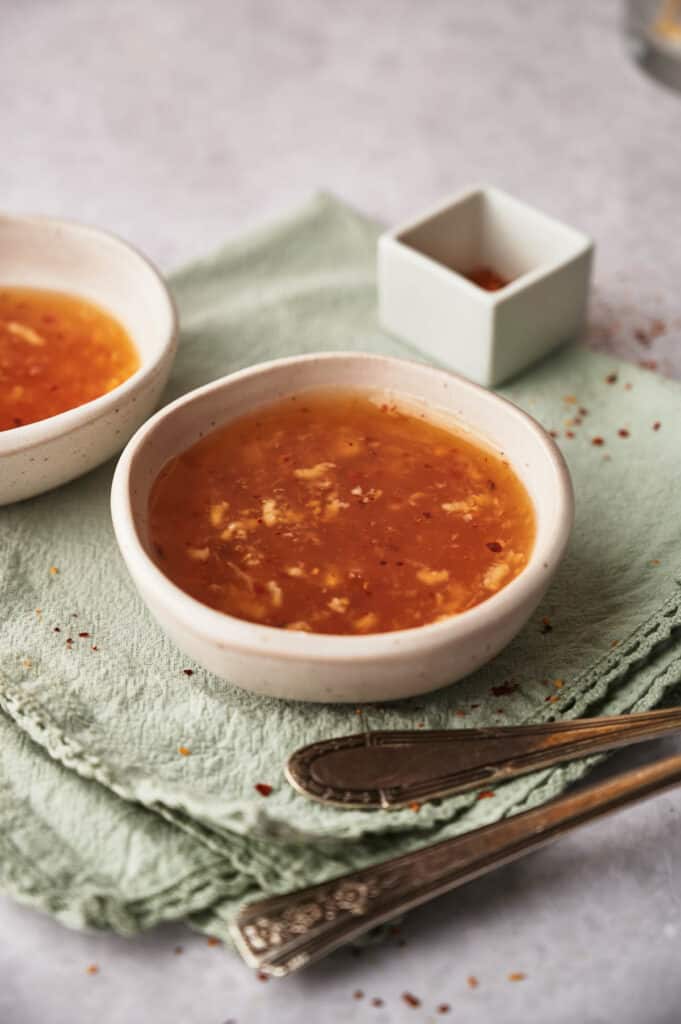 Homemade chili sauce, sweet and tangy, in a bowl.