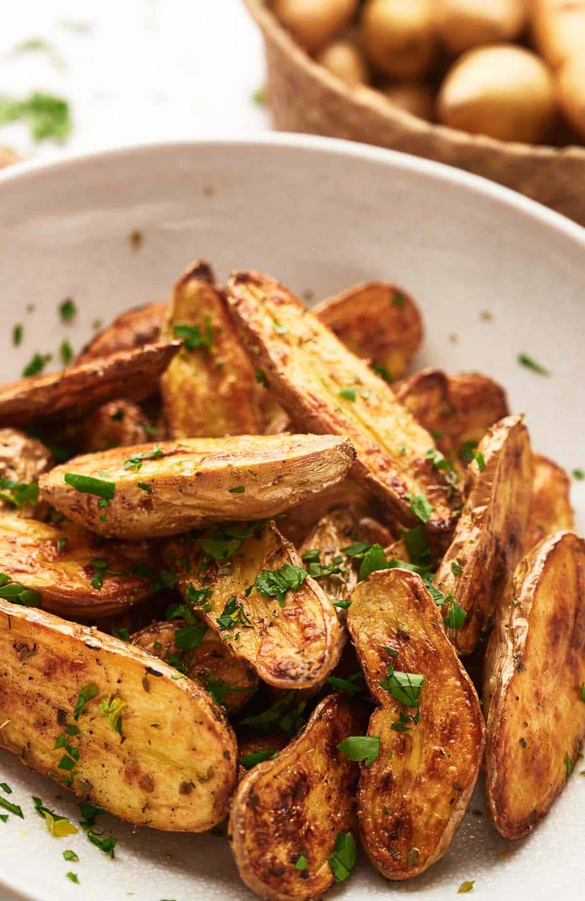 Crispy fingerling potatoes in a serving bowl.