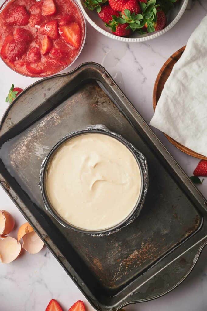 Cheesecake in springform pan before baking.