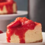 A slice of delicious air fryer strawberry cheesecake.