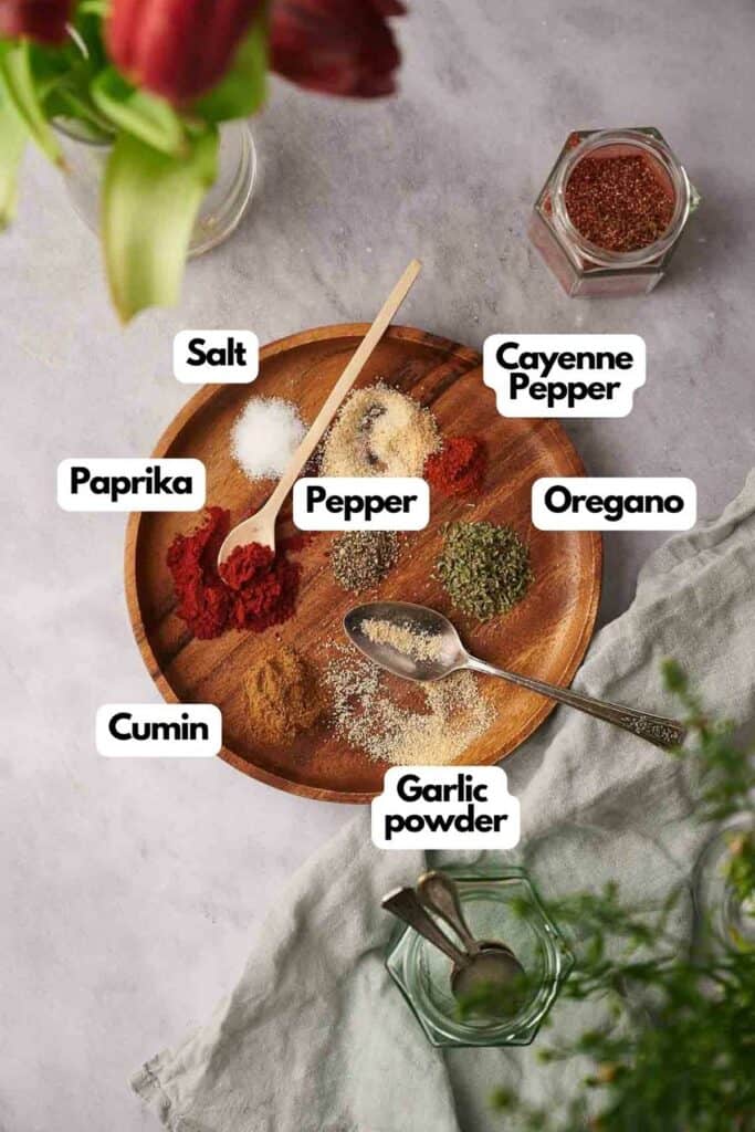 Ingredients needed, paprika, salt, cayenne pepper, oregano, garlic powder, black pepper, and cumin.