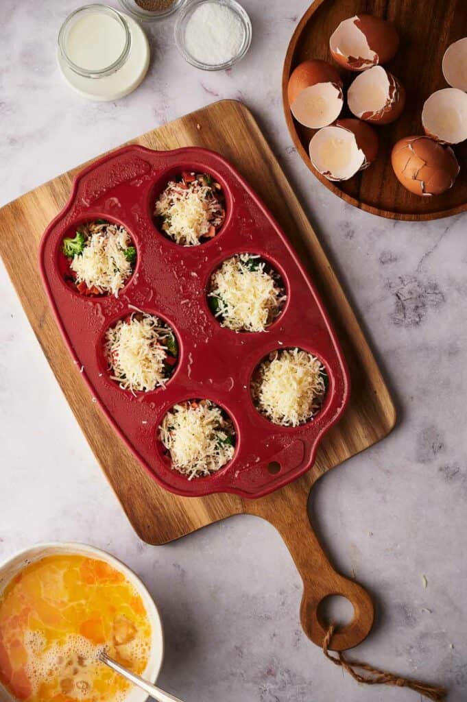 Cheese sprinkled on top of the veggies.
