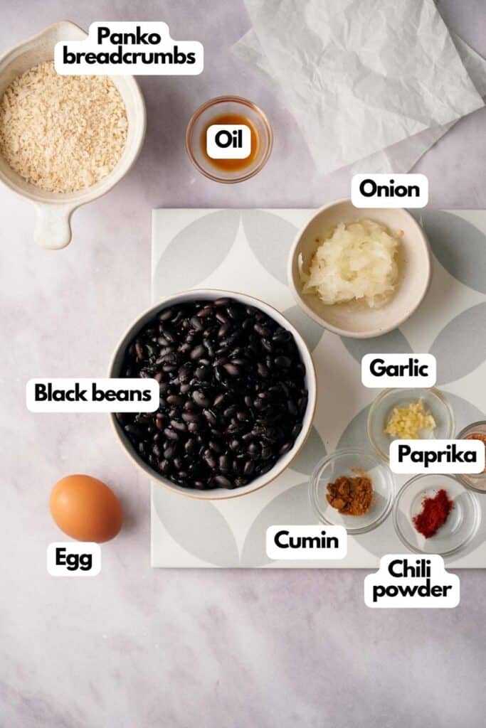 Ingredients needed; Panko breadcrumbs, oil, onion, garlic, paprika. chili powder, cumin, egg, and black beans.