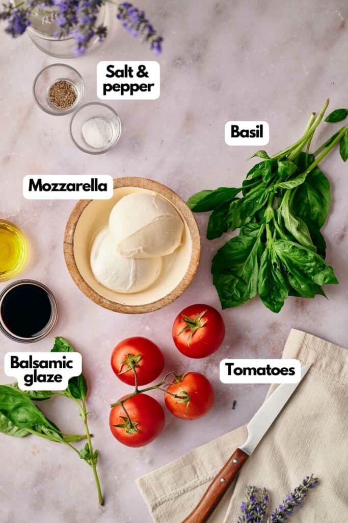 Ingredients needed, salt and pepper, fresh basil, tomatoes, balsamic glaze, and mozzarella.
