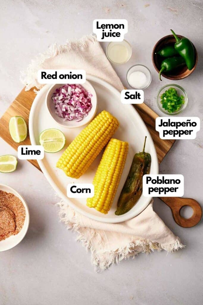 Ingredients needed; fresh lime, corn, roasted poblano peppers, salt, jalape&ntilde;o pepper, red onion, and lemon juice.