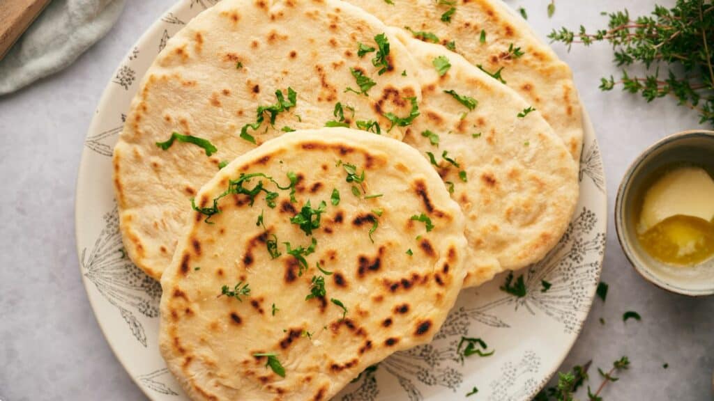 Freshly cooked flatbread on a plate.