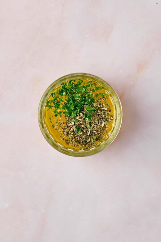 Dried ingredients added to the olive oil.