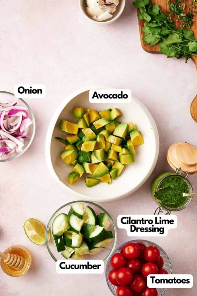 Ingredients needed; red onion, avocado, cilantro and lime dressing, and cucumber.