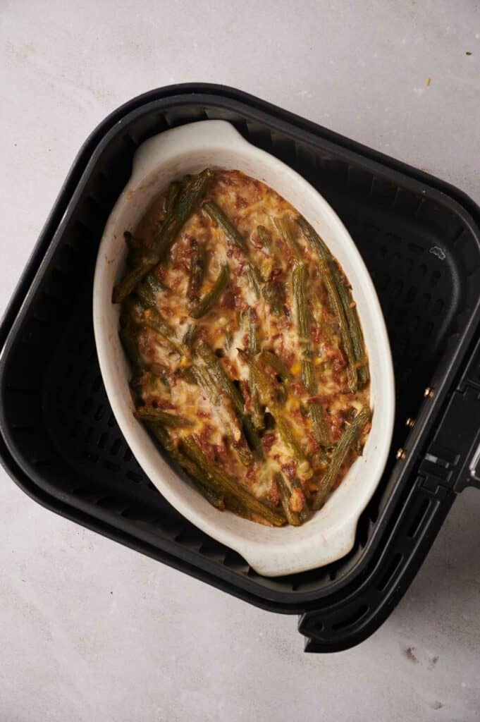 A dish of green bean casserole in an air fryer.