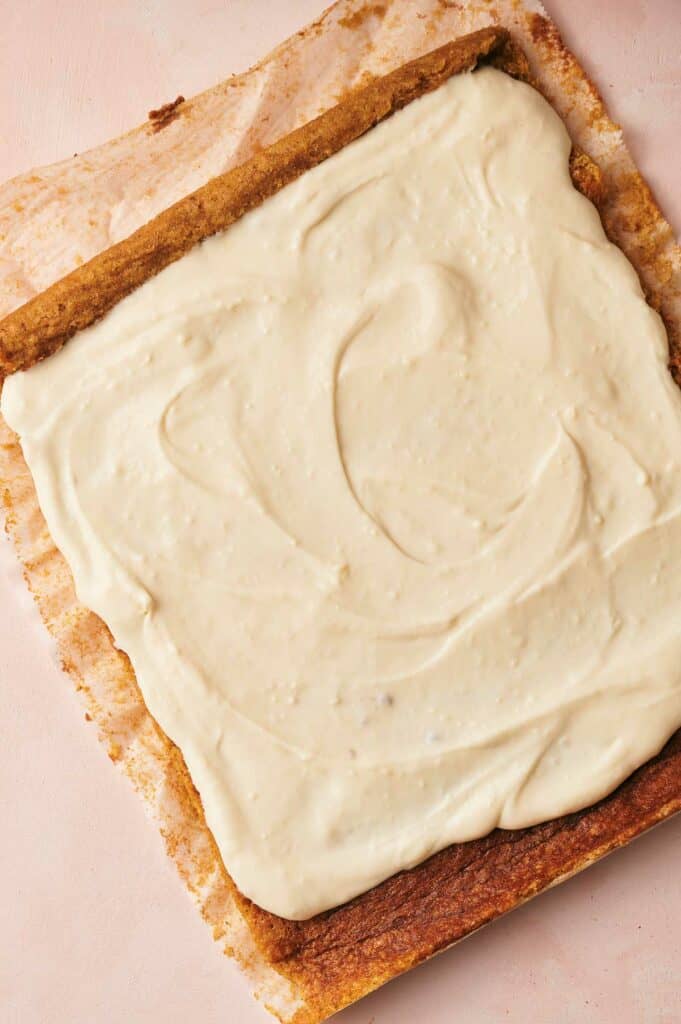 A square pie with icing on it.