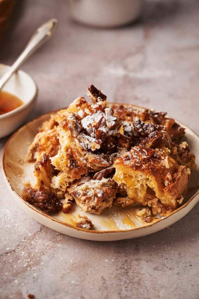 French Toast Casserole with pecans on a plate.