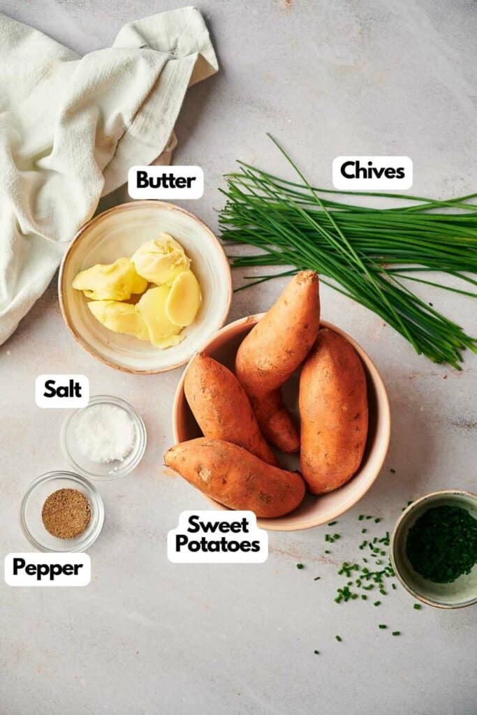 The ingredients for sweet potatoes and chives on a white background.