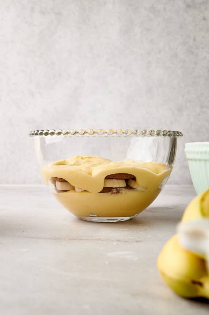 Banana pudding in a glass bowl.