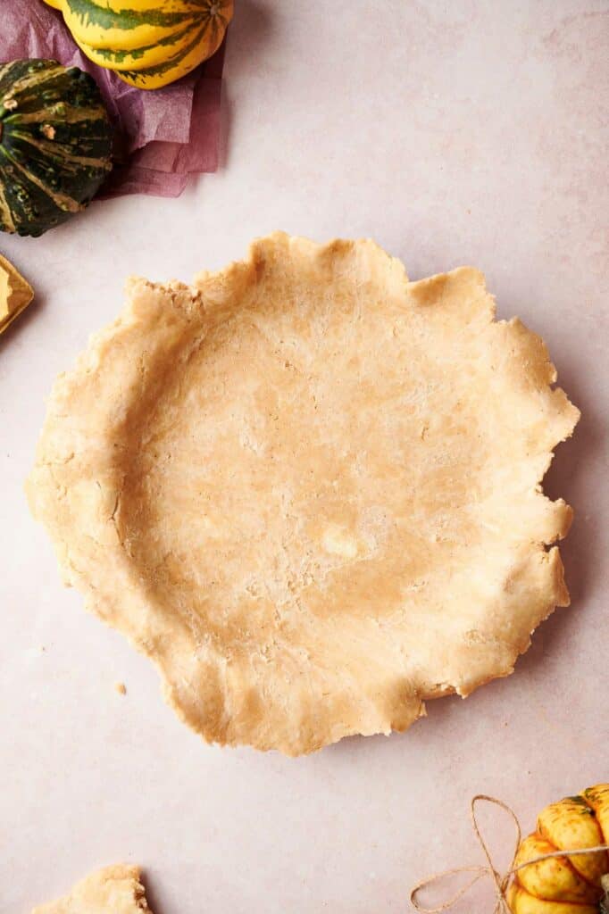 Pie crust placed in a pie dish.