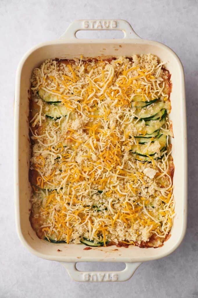 A casserole dish filled with zucchini casserole.